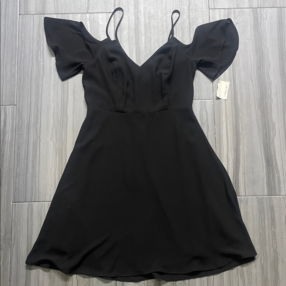 The Impeccable Pig Black Mini Dress